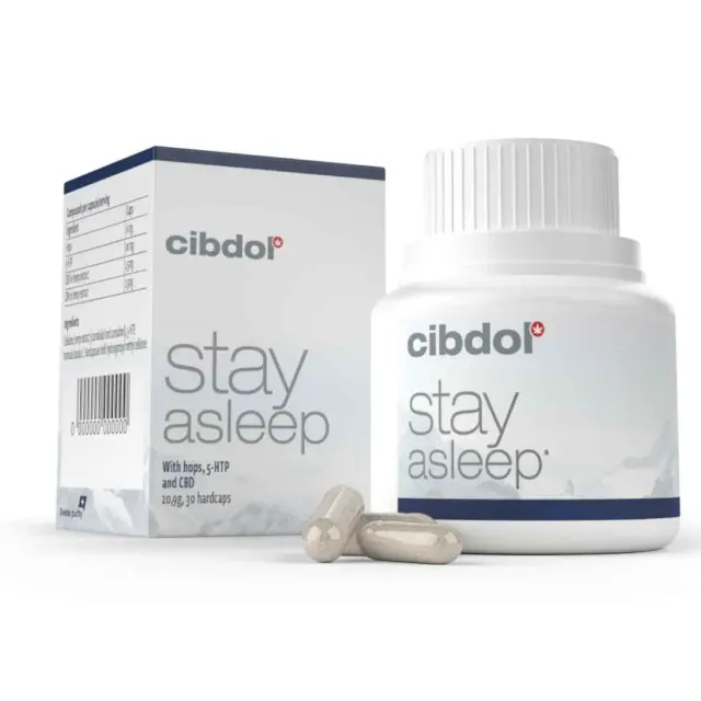 Een doos en flesje met het label "Cibdol - CBD en CBN Stay Asleep Capsules (30 stuks)" met twee capsules aan de voorkant. De verpakking vermeldt hop, 5-HTP, CBD en CBN en bevat 30 capsules.