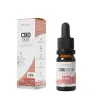 een flesje cbd olie naast een doosje cbd olie. miniatuur