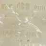 een close-up van een stuk glas met tekst erop. miniatuur